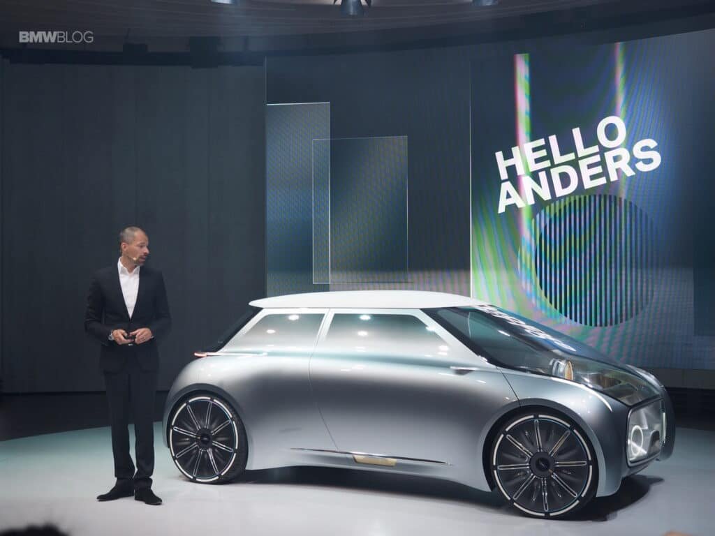 MINI Vision NEXT 100 concept car in silver, with adaptive digital lighting and futuristic design lines