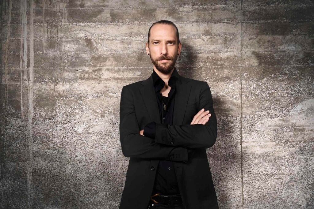 Former BMW i Head of Design Christopher Langer joins Xiaomi’s EV division, seen at the BMW Vision Neue Klasse unveiling.