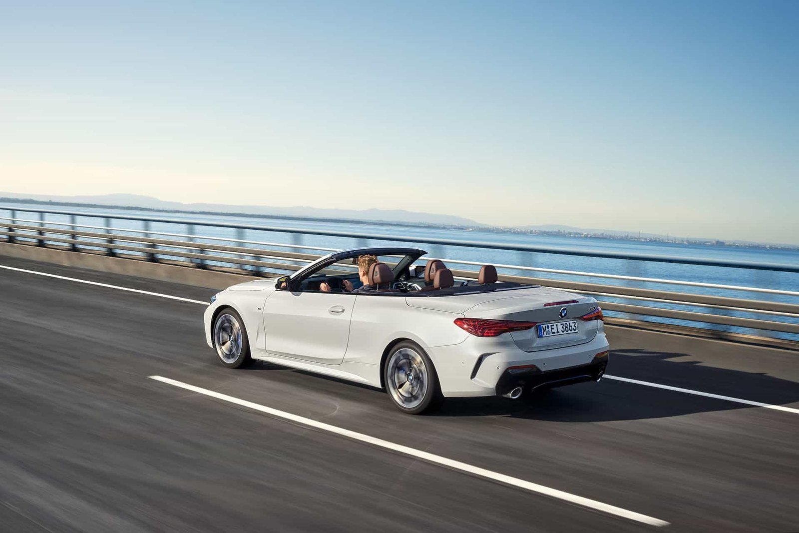 BMW 4 Series Convertible driving on the road