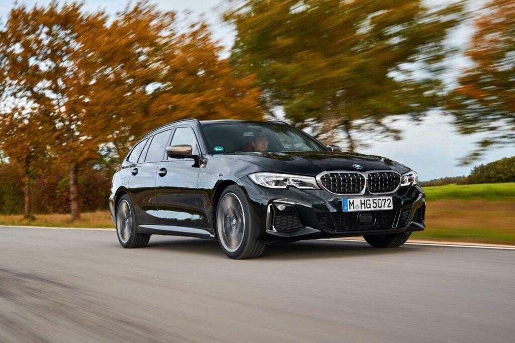 BMW M340d Touring driving on the road