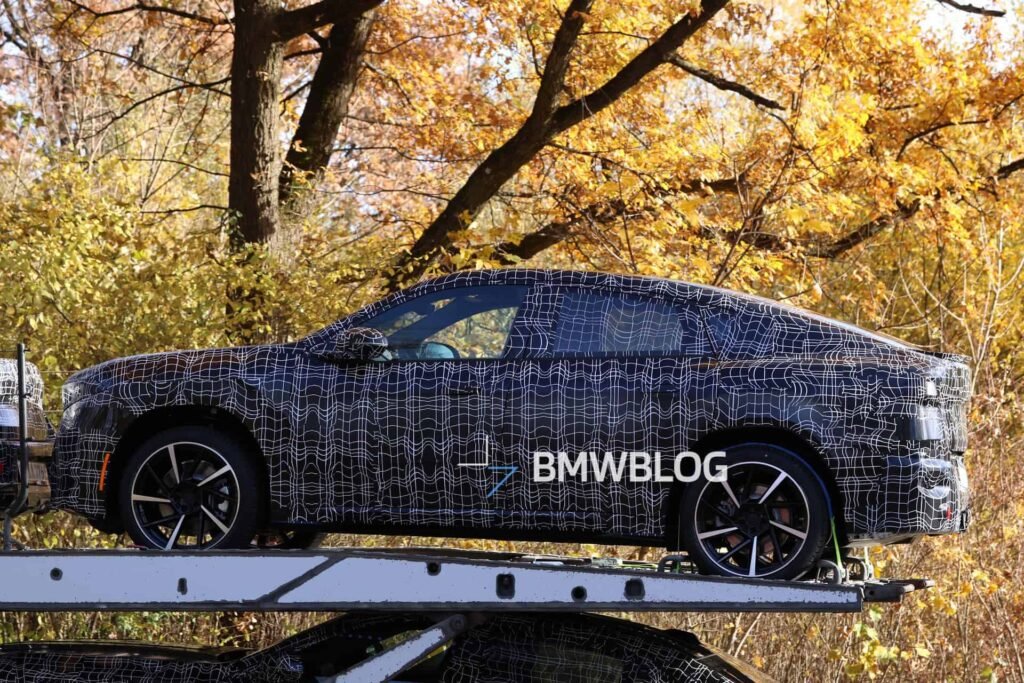 2027 BMW iX4 prototype spied testing with sloping coupe roofline