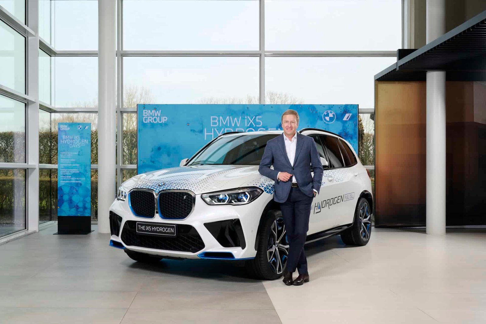 Oliver Zipse, BMW CEO and the BMW iX5 Hydrogen car