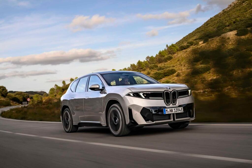 BMW IX3 SPACE SILVER on the road driving